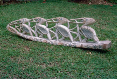 A selection of carved figures, canoe prows and ornaments from the Asmat tribe of Irian Java, the Indonesian part of New Guinea.