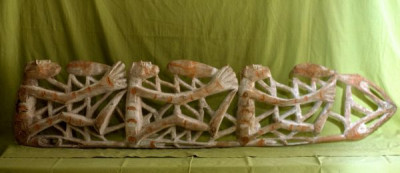 A selection of carved figures, canoe prows and ornaments from the Asmat tribe of Irian Java, the Indonesian part of New Guinea.