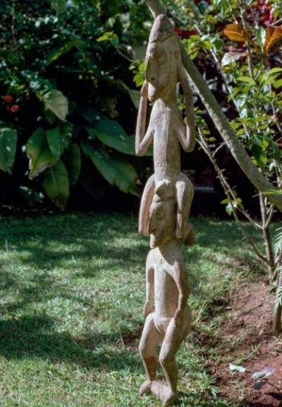 A selection of carved figures, canoe prows and ornaments from the Asmat tribe of Irian Java, the Indonesian part of New Guinea.
