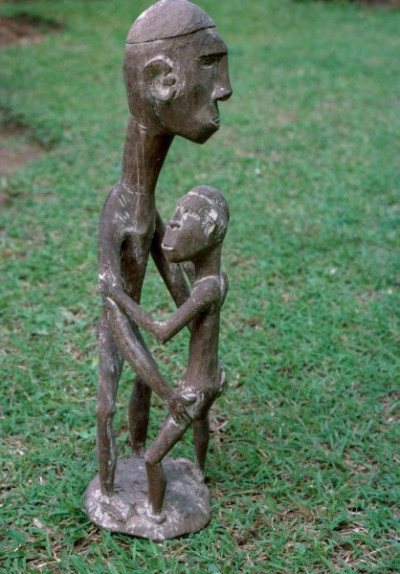A selection of carved figures, canoe prows and ornaments from the Asmat tribe of Irian Java, the Indonesian part of New Guinea.