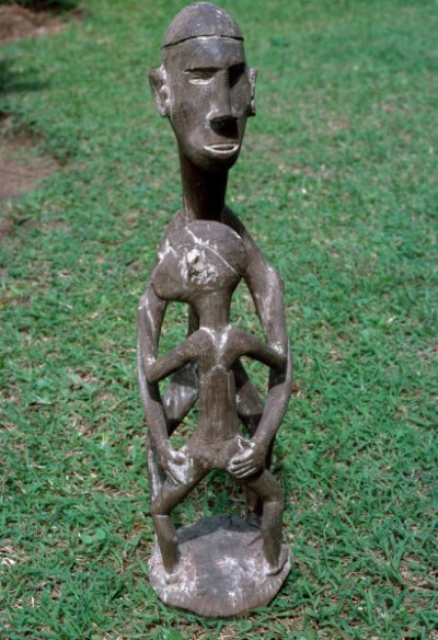 A selection of carved figures, canoe prows and ornaments from the Asmat tribe of Irian Java, the Indonesian part of New Guinea.