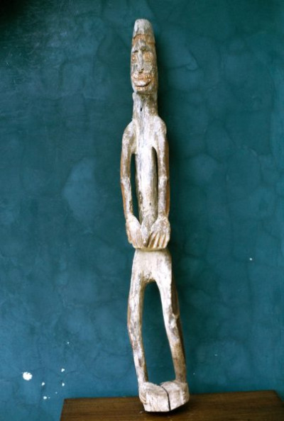 A selection of carved figures, canoe prows and ornaments from the Asmat tribe of Irian Java, the Indonesian part of New Guinea.