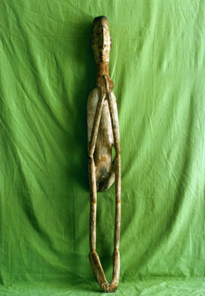 A selection of carved figures, canoe prows and ornaments from the Asmat tribe of Irian Java, the Indonesian part of New Guinea.