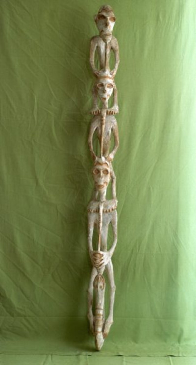 A selection of carved figures, canoe prows and ornaments from the Asmat tribe of Irian Java, the Indonesian part of New Guinea.
