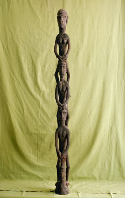 A selection of carved figures, canoe prows and ornaments from the Asmat tribe of Irian Java, the Indonesian part of New Guinea.