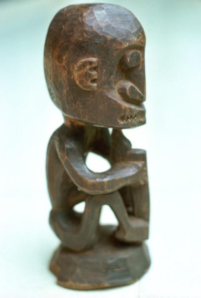A selection of carved figures, canoe prows and ornaments from the Asmat tribe of Irian Java, the Indonesian part of New Guinea.