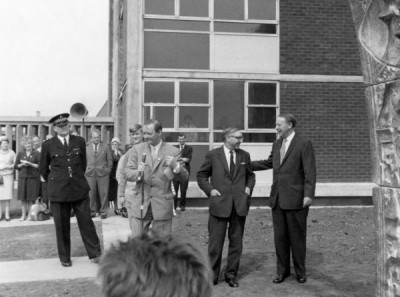 T Dan Smith Archive: T Dan Smith making speech at ceremony, outside flats, c. 1960s-1970s