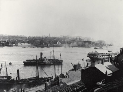 Lee Collection: Warship Being Towed Down the Tyne, c. 1890s