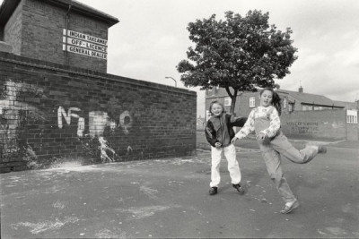 Meadow Well: Youngsters behind burnt out shop, Ripley Avenue, 1988-1991