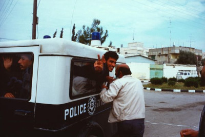 Gaza Strip: Defiant smile leaving the military court, 1987/1988