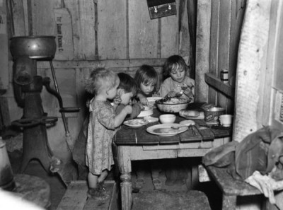 Russell Lee Collection: Christmas Dinner in Home of Earl Pauley, Near Smithland, Iowa, 1936