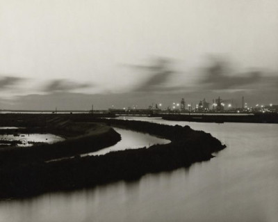 Tees Estuary: The sea is kept off the land by long miles of slag embankment - completed in 1888, c. 1980
