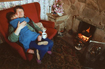 People of the Hills: Glenys Scott looks after grandson Matthew as her daughter works on the land at Holwick, Newbiggin Farm, Teesdale, 1994